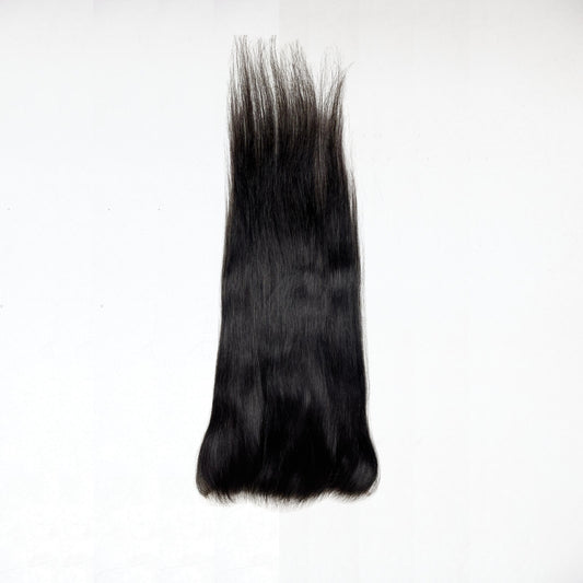 Black hair extension on a white background
