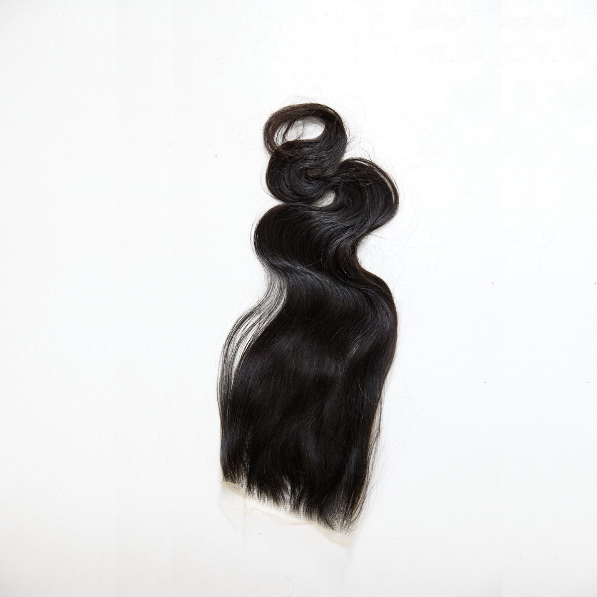 Black hair bundle on a white background
