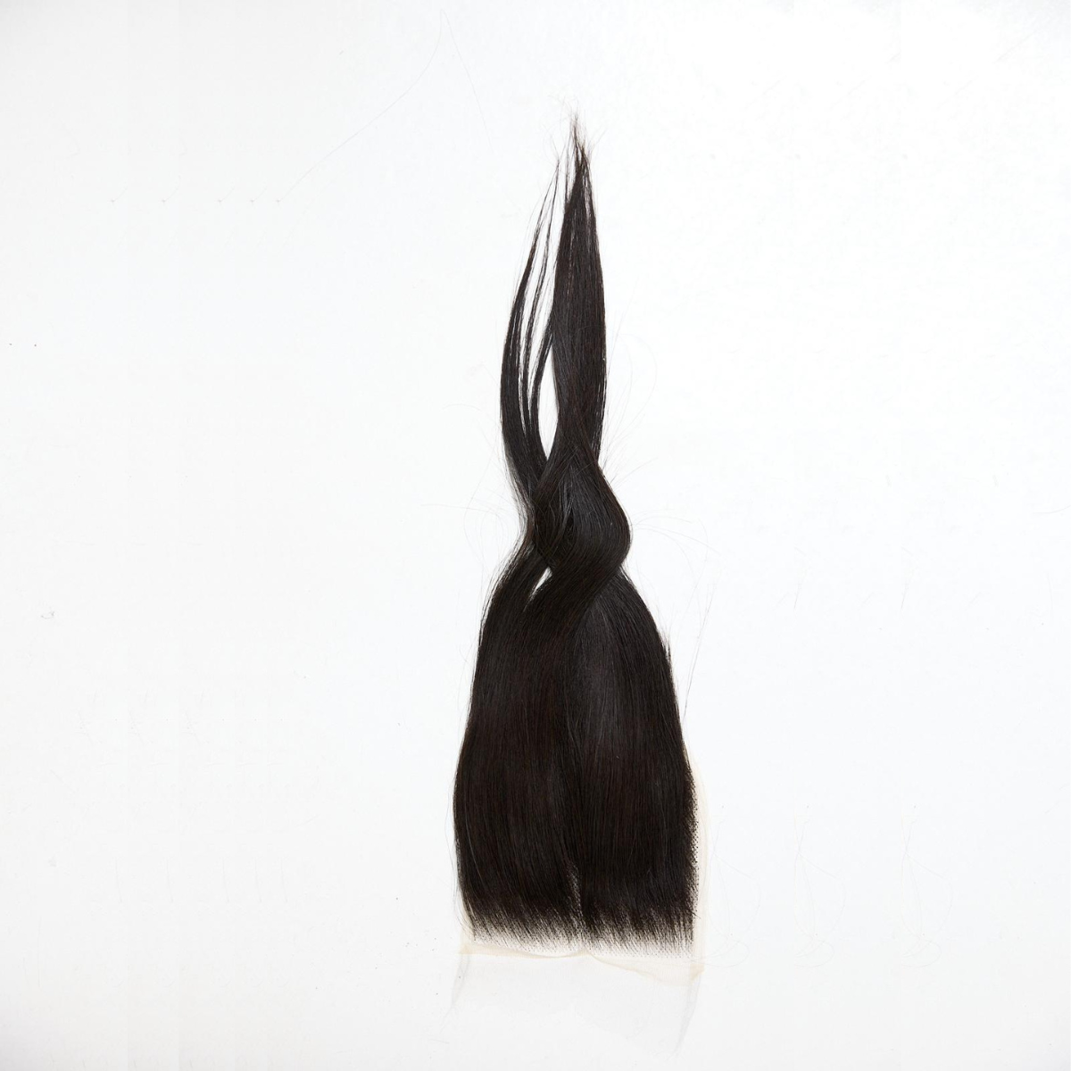 Black hair extension on a white background