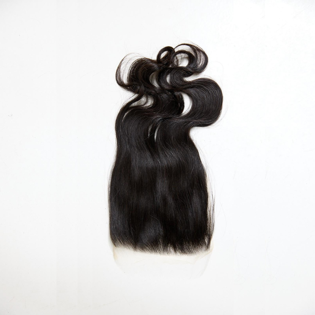Black hair extensions on a white background
