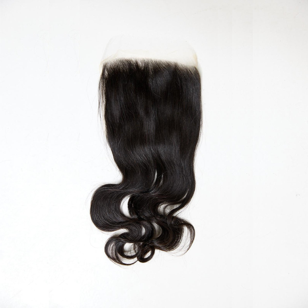 Black hair extension with a lace front on a white background