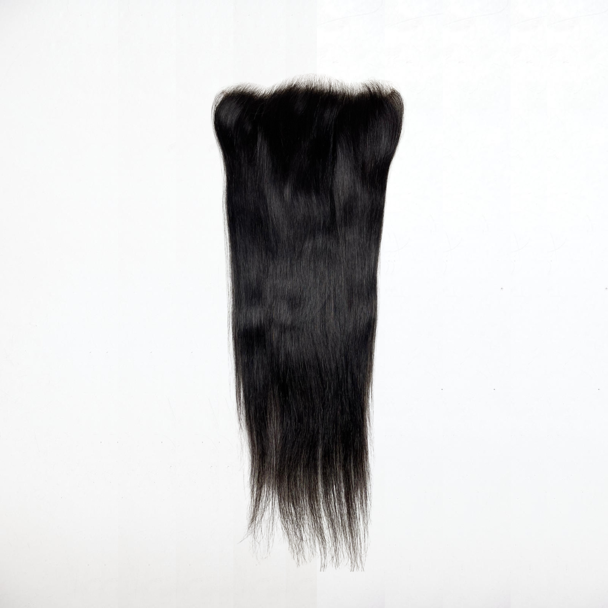 Black hair extension on a white background